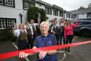 Head housekeeper Gillian Gaston opens The Pheasant Inn at Bassenthwaite Cumbria