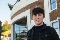 Oliver Hodgson outside Whitehaven's bus station offices