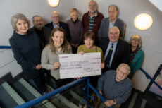 The Friends handing over the final cheque