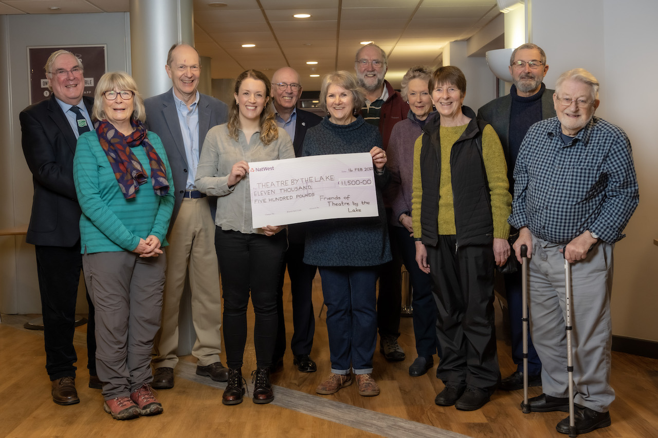 The Friends handing over the final cheque