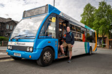 Lewis Jevons climbs all the Wainwright Fells using only public transport to get to each location. Pictures from his journey via bus to his final fell, Rannerdale Knotts, from Keswick. // Lewis boards the bus from Keswick. © Harry Atkinson