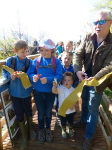 Terry Abraham and photography competition winners declare Dam Mire Wood open