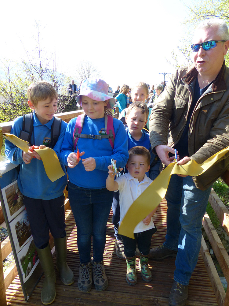 Terry Abraham and photography competition winners declare Dam Mire Wood open