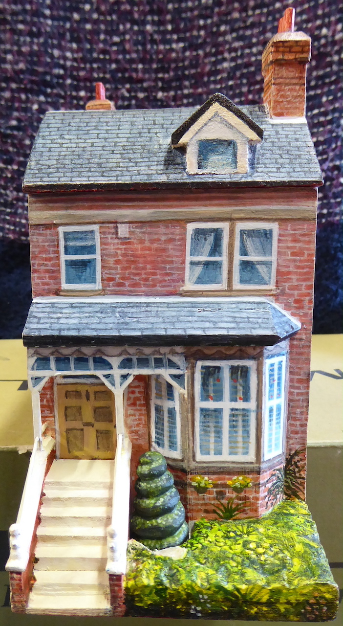 Housebox, one of several intriguing carved and painted creations from RAM Workshops (Richard and Mary Kennedy)