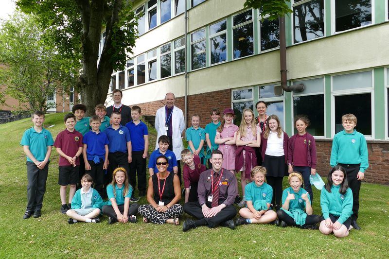 : Blast off: Cameron Stewart from Sainsbury’s & Rebekkah Minchin-Hepburn from The Lakes Free Range Egg Company and Mr Ford with pupils from Bolton (teal) Crosby Ravensworth (Burgundy) and Asby (blue) primary schools.