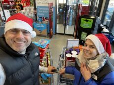 James dropping off the donation at the food bank.
