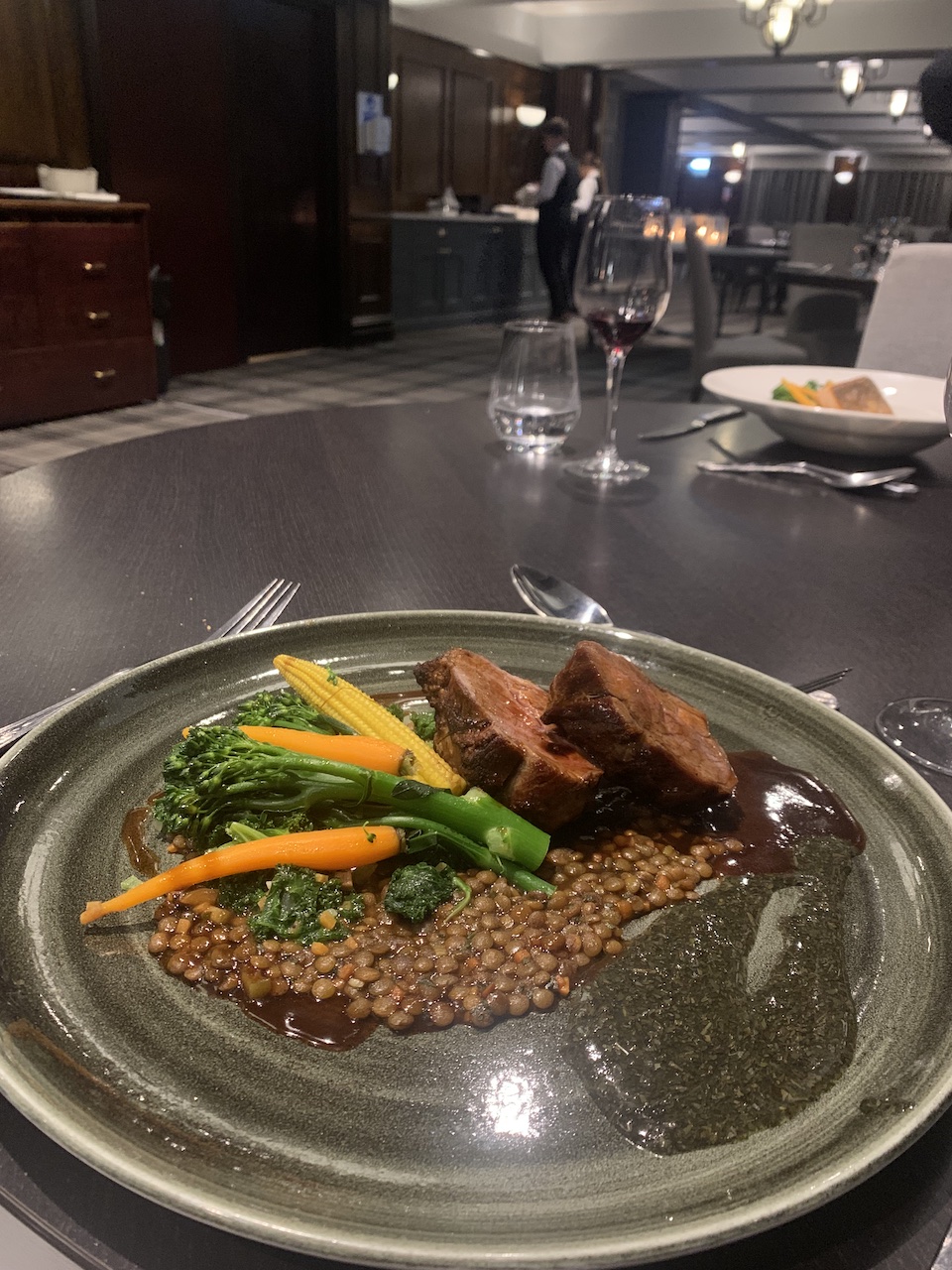 Rump lamb with mint salsa, green lentil fumet with sautéed hispi cabbage.