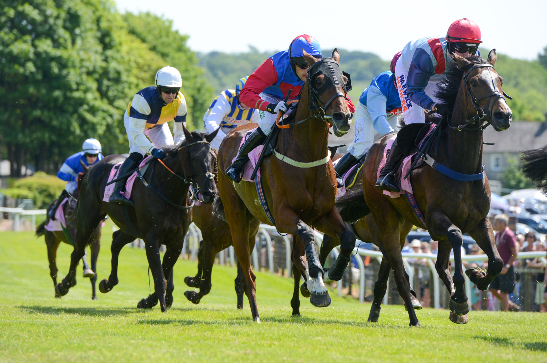 Cartmel Races horses and jockeys