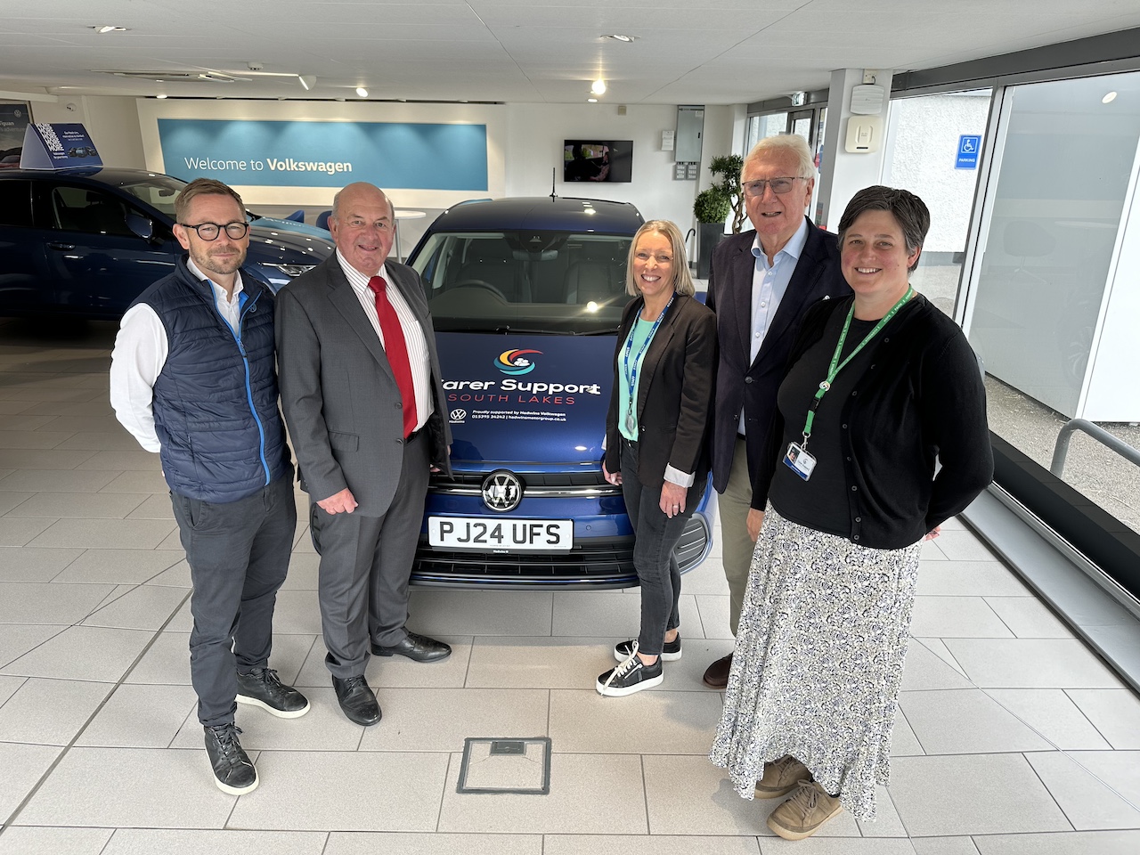 Left-to-right Hadwins VW Sales Manager Ian Aplin, Hadwins VW MD Roy Allen, Chair of Carer Support South Lakes, James Alexander, CSSL Business Development Administrator, Claire Mason and CSSL Business Development Manager, Cheryl Duckworth