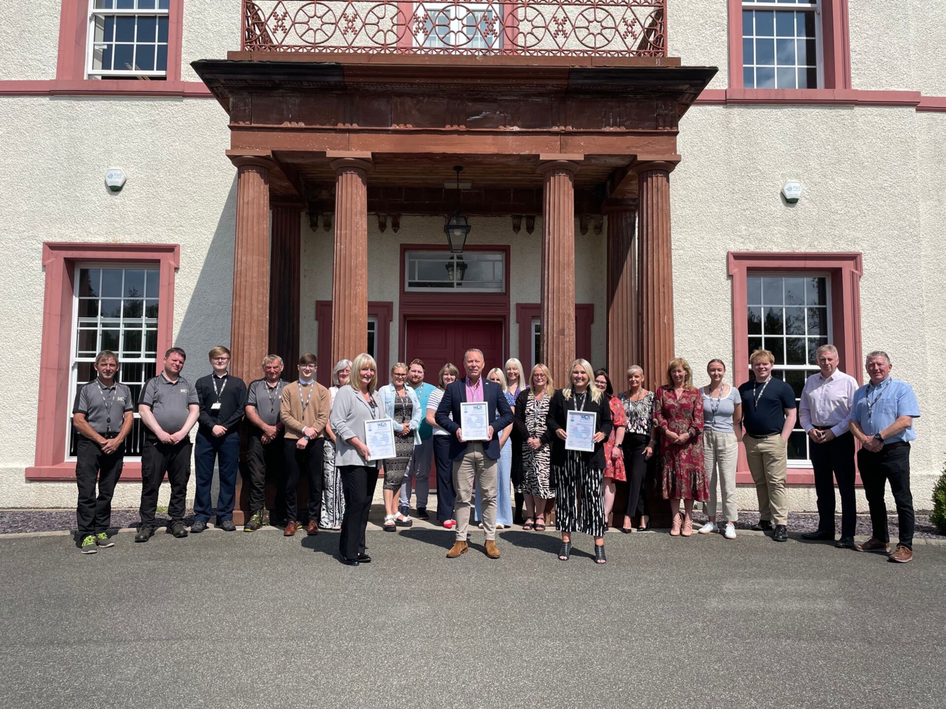BEC team celebrating their accreditations