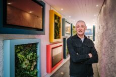 Matthew Brown and his innovative lighting, signage and seating scheme, Wainwright's Yard, Kendal. It's now a new design service he's offering. Image Steve Barber.